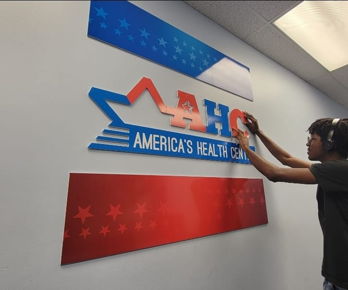 WALL SIGN INSTALLATION – AMERICA’S HEALTH CENTER